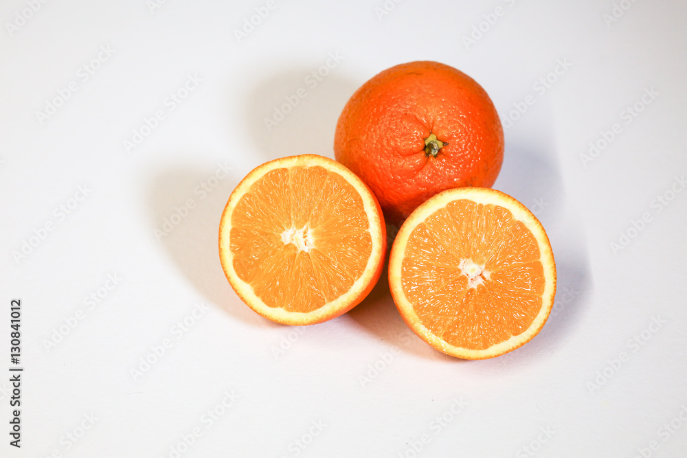 Oranges on a white surface Oranges on a white surface