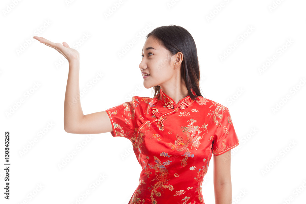 Asian girl in chinese cheongsam dress with blank space on her h Asian girl in chinese cheongsam dress with blank space on her h