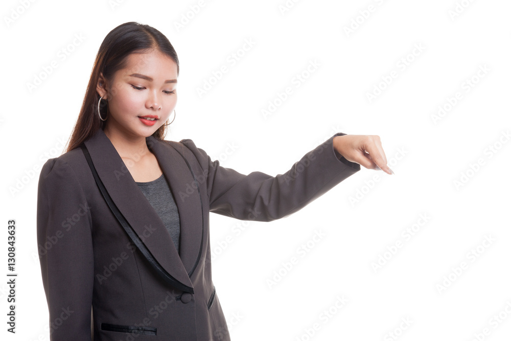 Beautiful young Asian woman point down to blank space. Beautiful young Asian woman point down to blank space.