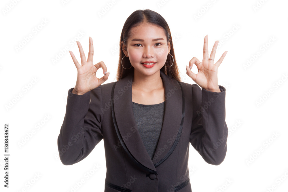 Asian business woman show double OK hand sign and smile. Asian business woman show double OK hand sign and smile.