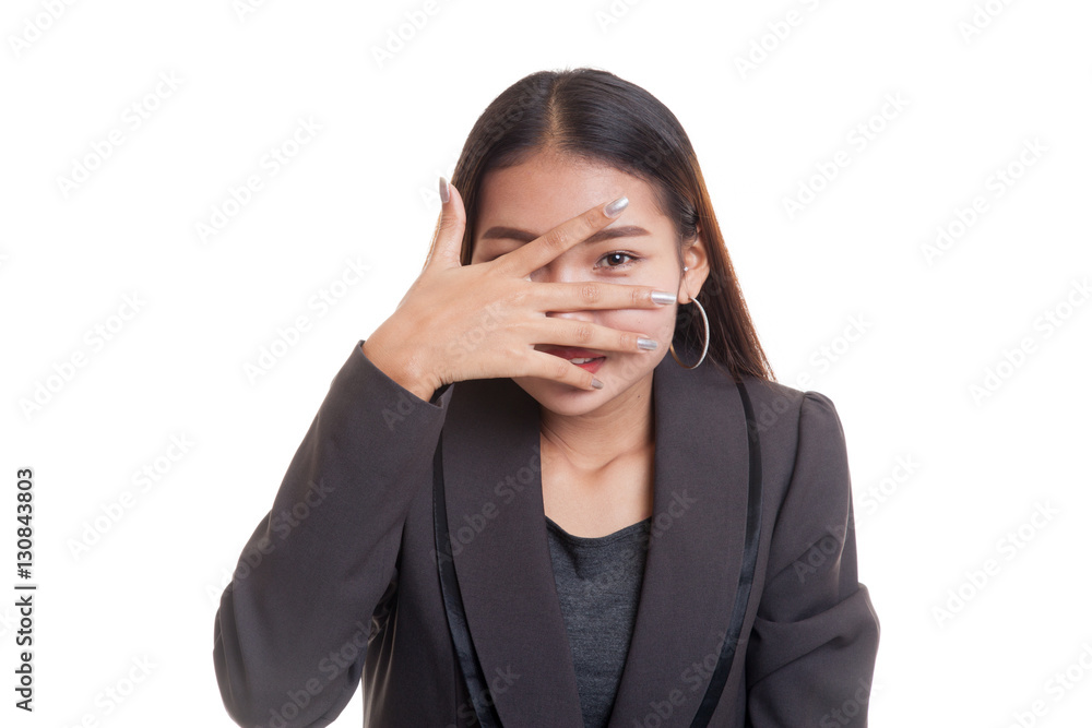 Beautiful young Asian woman peeking through fingers. Beautiful young Asian woman peeking through fingers.