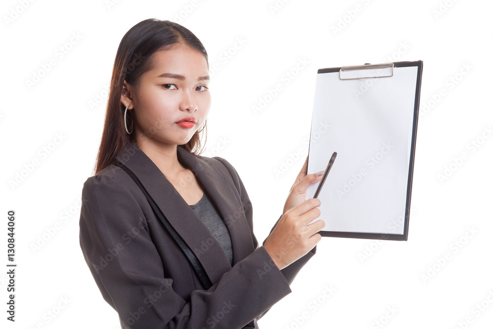 Unhappy Asian business woman point to clipboard with pen. Unhappy Asian business woman point to clipboard with pen.