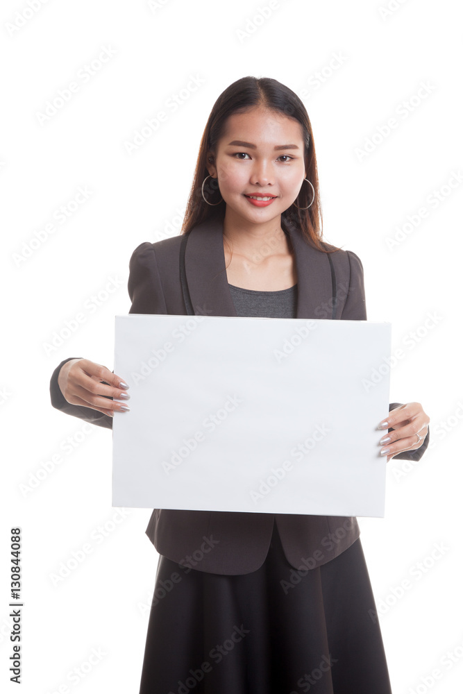 Young Asian business woman with white blank sign. Young Asian business woman with white blank sign.