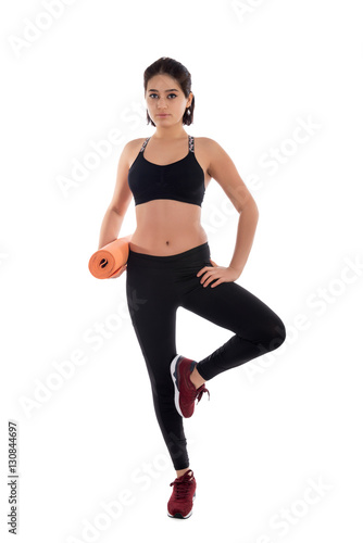 Sport girl doing yoga isolated on white background © DedOK Studio