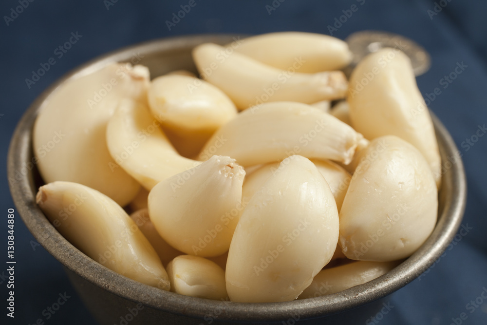 peeled garlic cloves peeled garlic cloves