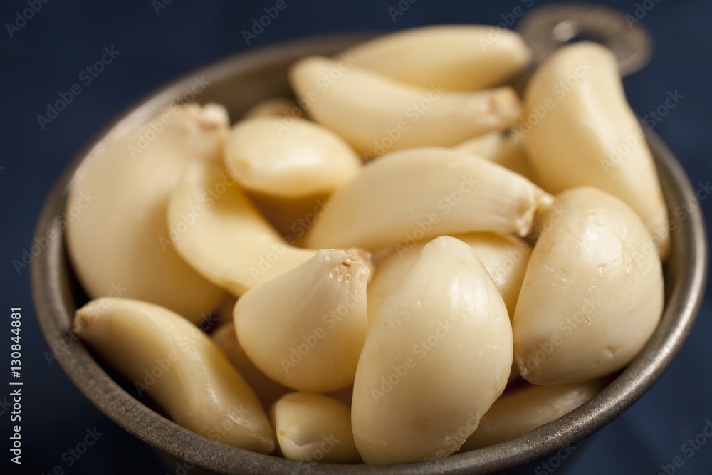 peeled garlic cloves peeled garlic cloves