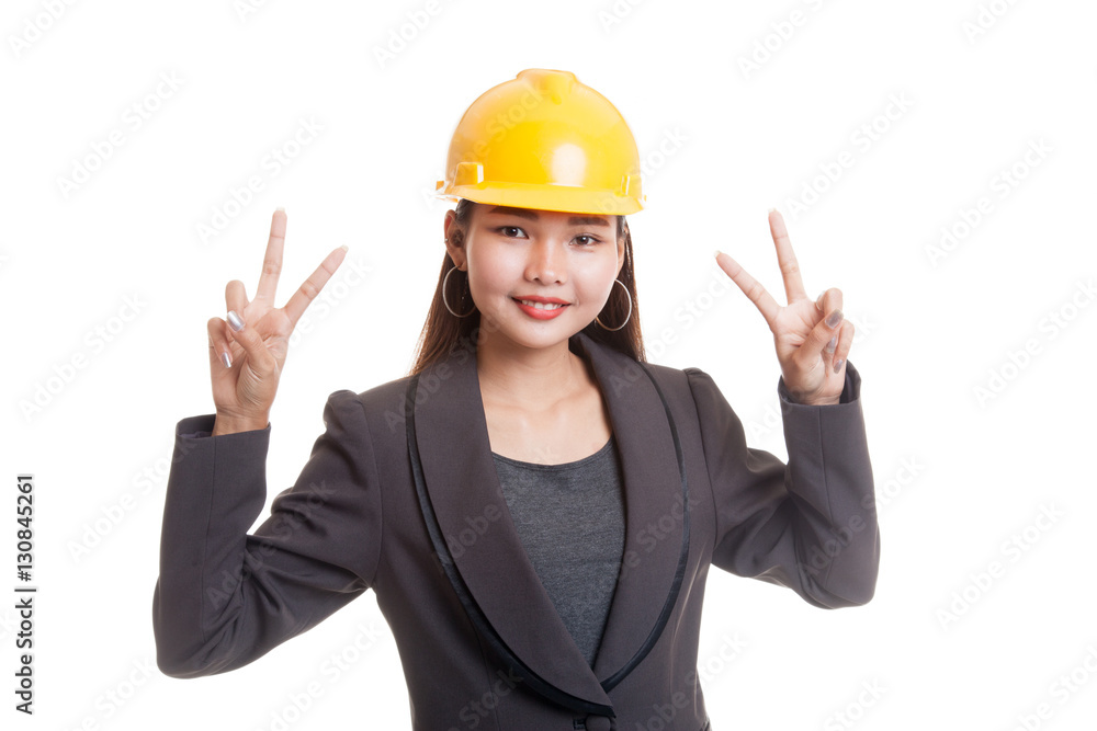 Asian engineer woman show victory sign with both hands.