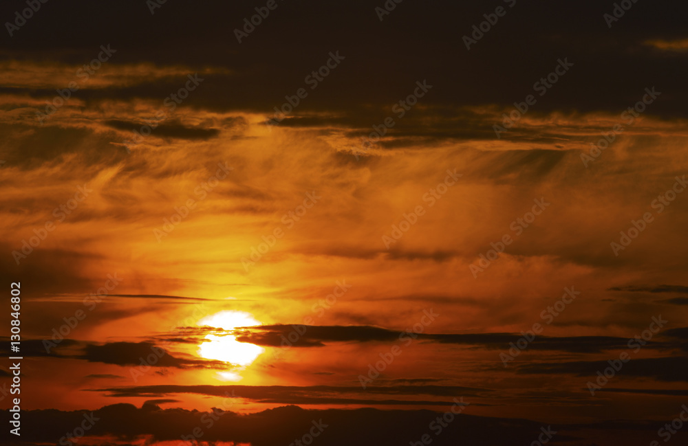 Beautiful sunset with dramatic clouds on the sky Beautiful sunset with dramatic clouds on the sky
