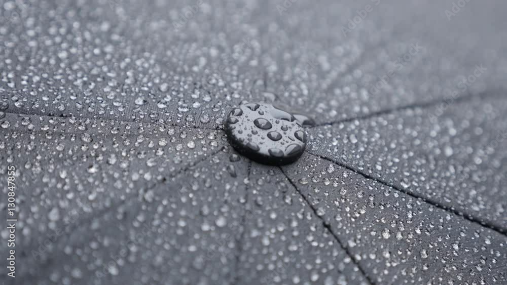 Top of black umbrella surface weather forecast background slow-mo 1080p FullHD footage - Slow motion of water-proof protective dark fabric texture on rainy day 1920X1080 HD video Top of black umbrella surface weather forecast background slow-mo 1080p FullHD footage - Slow motion of water-proof protective dark fabric texture on rainy day 1920X1080 HD video