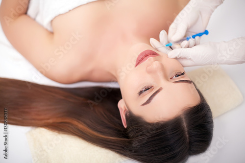 Woman Having Injection In Lips As Beauty Treatment