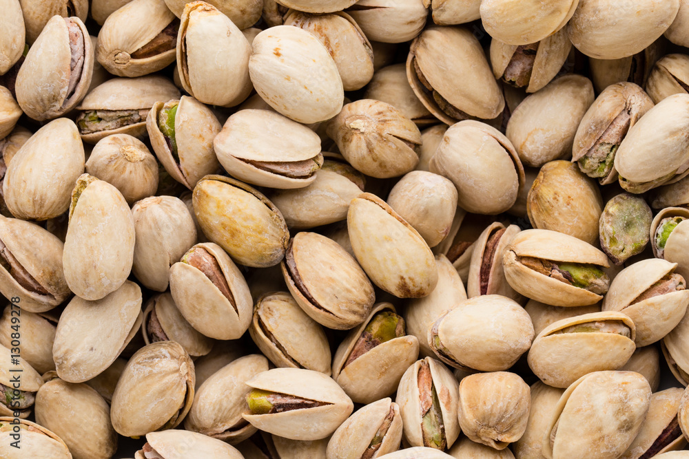 Roasted and salted pistachios in shell. Roasted and salted pistachios in shell.