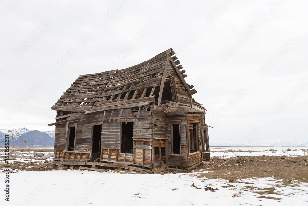 Old abandoned farm house in winter with snow. Old abandoned farm house in winter with snow.