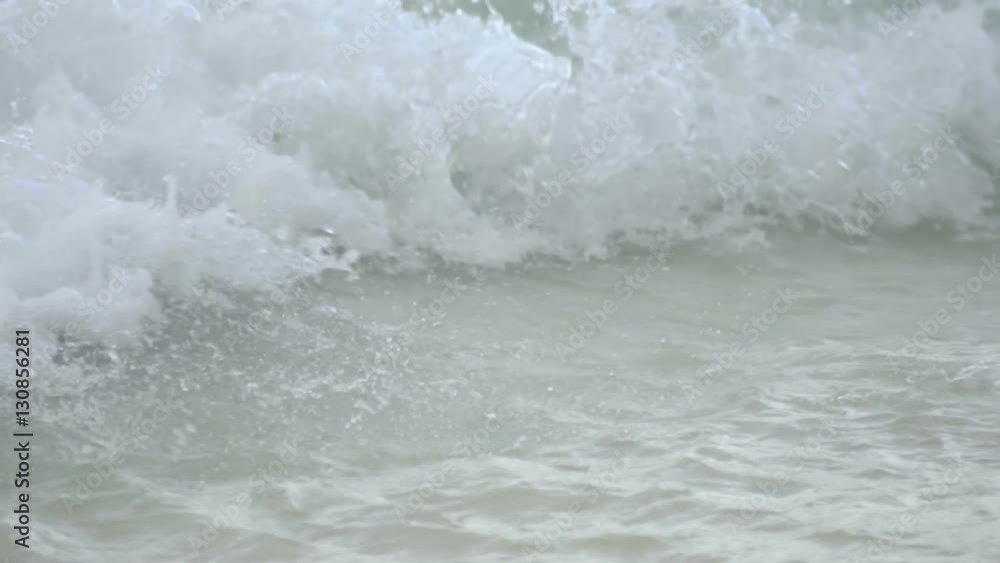 Rolling wave close-up, slow motion Rolling wave close-up, slow motion