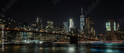 Obraz na płótnie Brooklyn Bridge and New York City at night w salonie