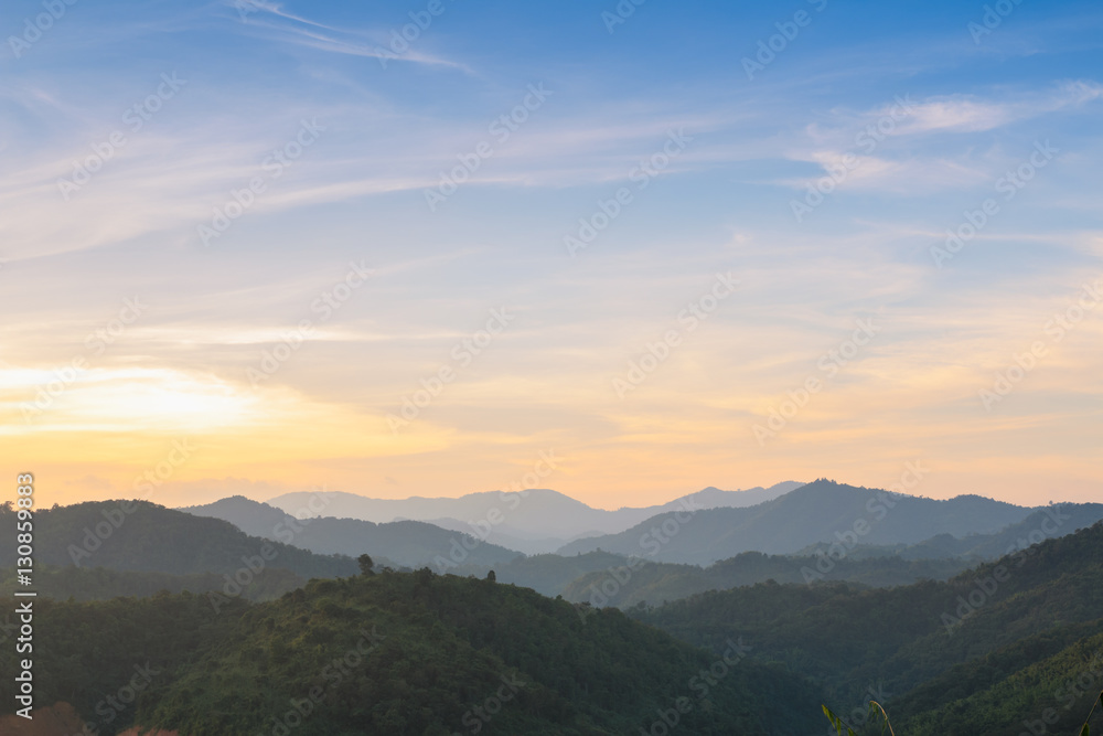 Beautiful color sky of last light on the mountains forest nature