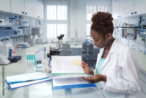 African scientist, medical worker or tech in modern laboratory