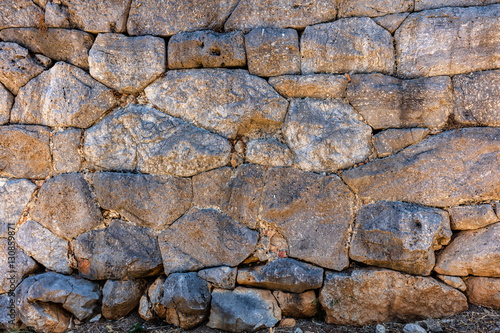 Interlocking polygonal megalithic stonework on the temple of Diana's wall in Cefalu, Sicily, Italy