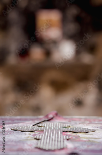 Old orthodox cross on the monastery table