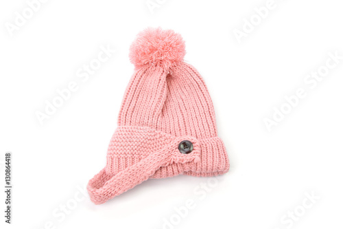 pink knitted hat with pompom isolated on white background