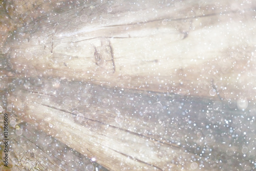 blurred wooden background with snow winter © kichigin19