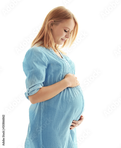 Pregnant woman on light bac...