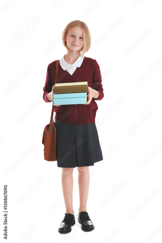 Schoolgirl with books and bag isolated on white Schoolgirl with books and bag isolated on white