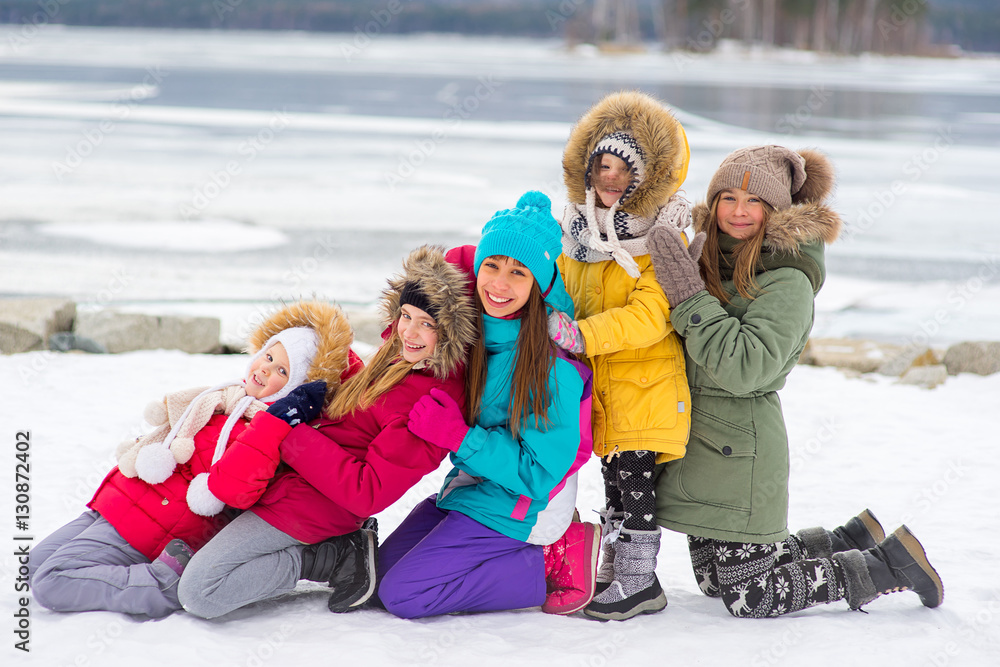 Group of young girls on the frozen lake
