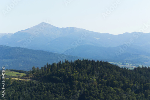 Isolated on blue sky mountain peaks