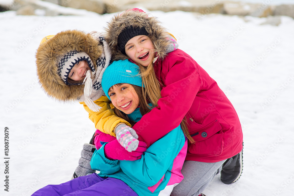 Group of young girls on the frozen lake