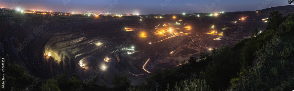 Naklejka premium Wide angle night shot of the biggest open pit in Krivoy Rog