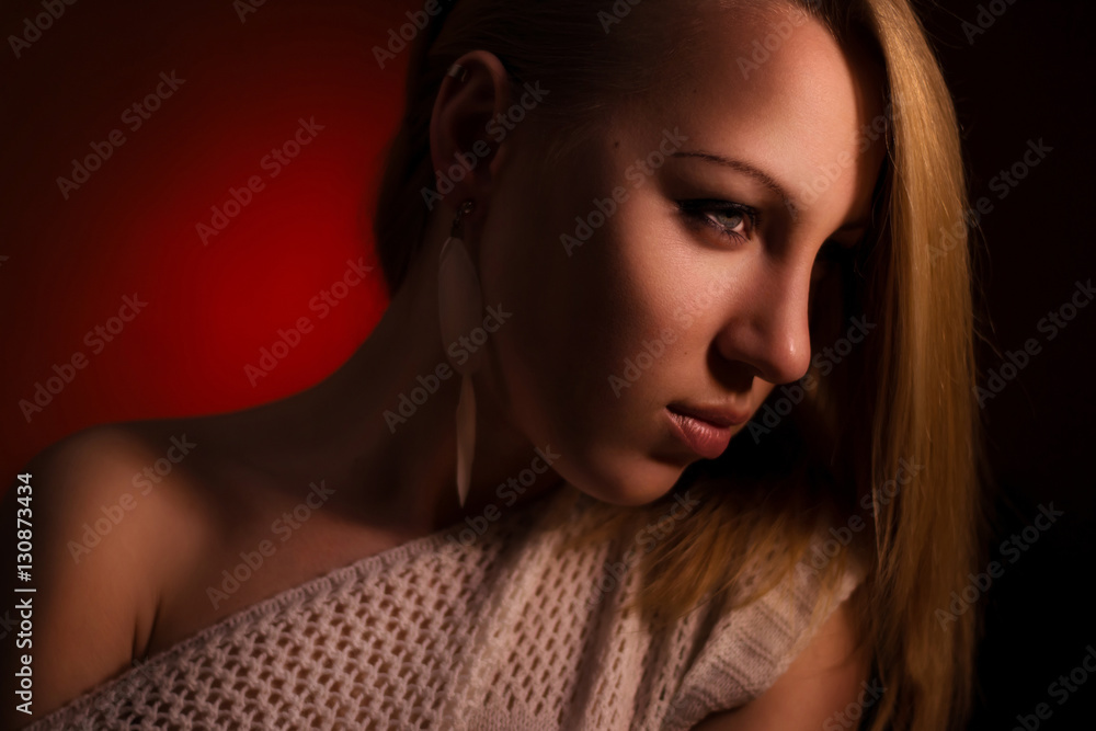 Dark portrait with red background Dark portrait with red background