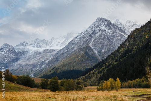 Fototapeta Naklejka Na Ścianę i Meble -  Dramatic autumn landscape of Mountain ridge under heavy clouds.