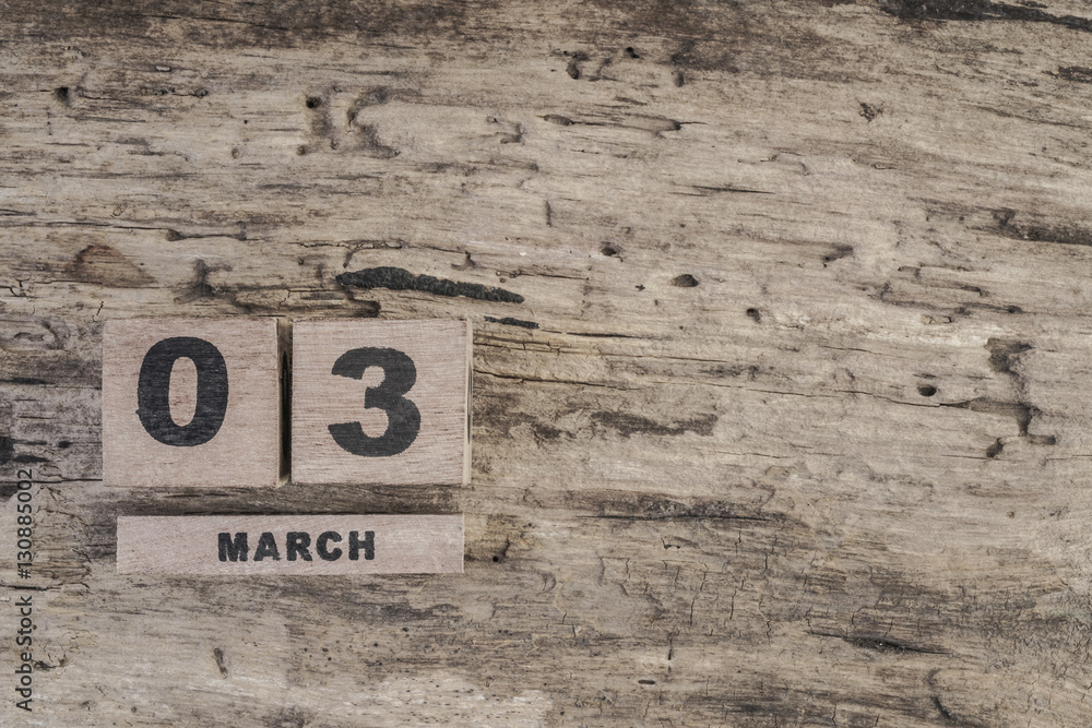 cube calendar for march on wooden background cube calendar for march on wooden background