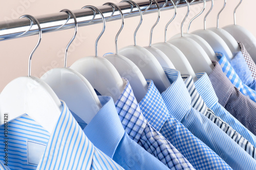 Cloth Hangers with Shirts. Men's clothes