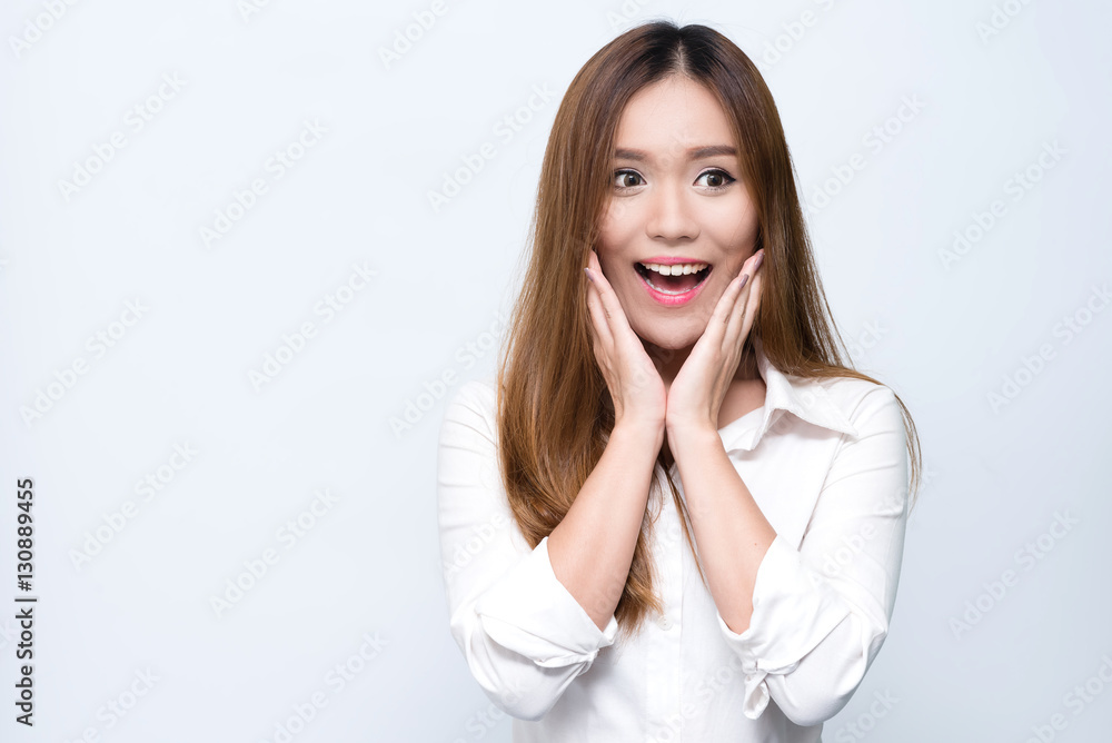 Young beautiful smiling Asian woman express surprised and excited. Young beautiful smiling Asian woman express surprised and excited.