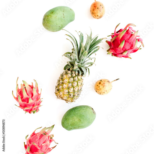Fototapeta Naklejka Na Ścianę i Meble -  Exotic fruits: mango, pineapple, passion fruit and dragon fruit. Flat lay, top view