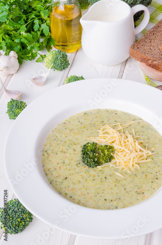 Creamy soup puree with broccoli and green peas