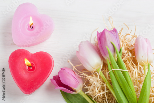 Red pink heart candles and tulips
