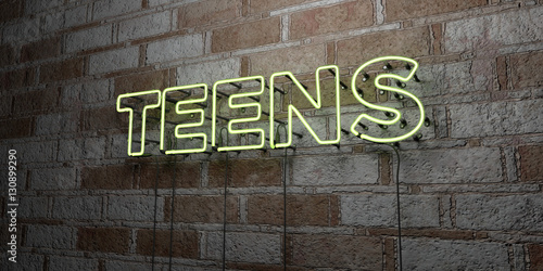 TEENS - Glowing Neon Sign on stonework wall - 3D rendered royalty free stock illustration.  Can be used for online banner ads and direct mailers.. photo