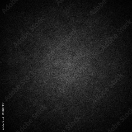 Black scratched grunge stucco wall background or texture photo