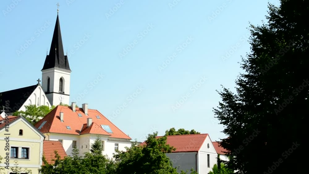 view of the small village in the countryside - church dominates view of the small village in the countryside - church dominates