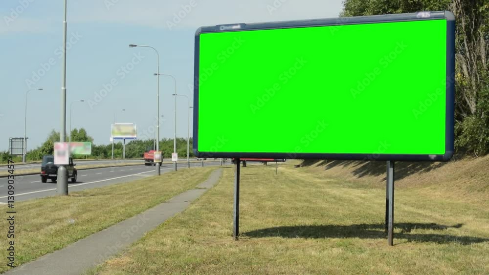 view of the advertising billboard near by the road - green screen view of the advertising billboard near by the road - green screen