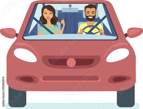 Happy couple driving car