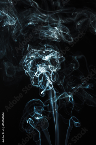 Blue smoke abstract on a dark background