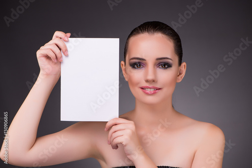 Beautiful woman with blank message paper