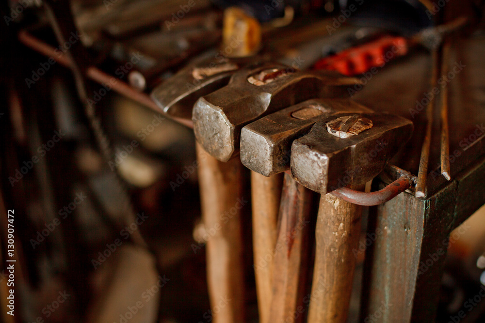Different metal worker tools on wooden table Different metal worker tools on wooden table