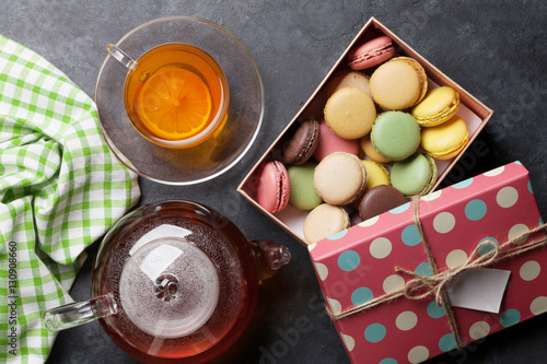 Tea cup, teapot and macaroons