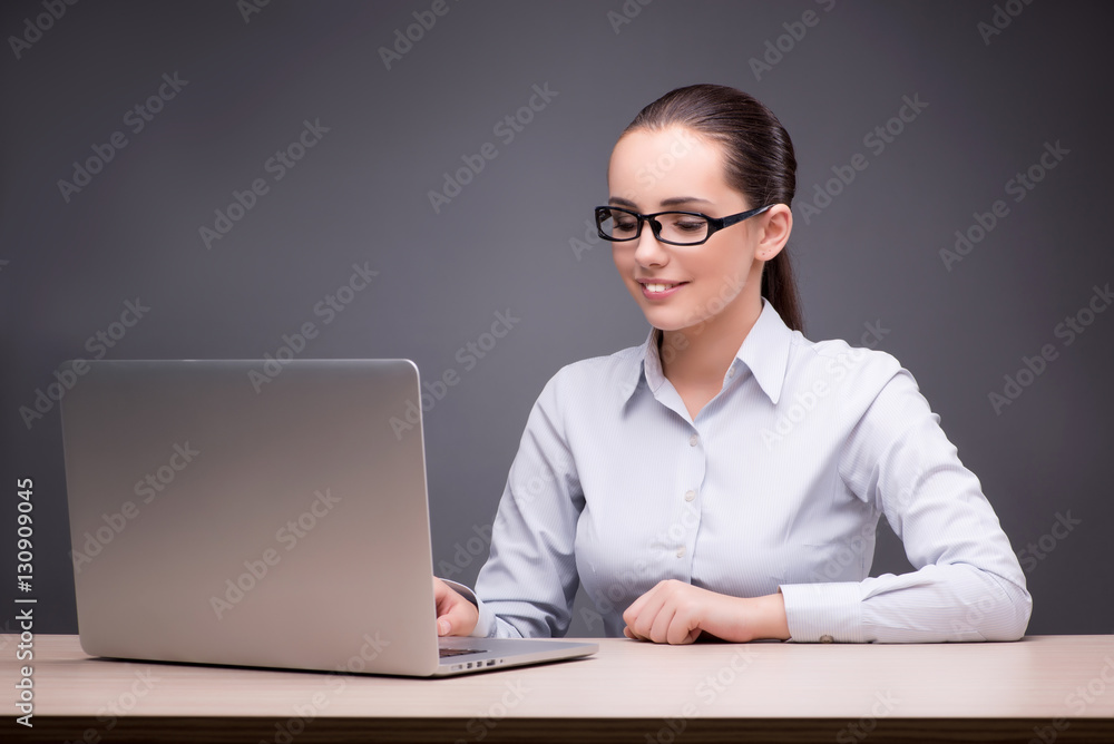 Businesswoman working at her desk Businesswoman working at her desk