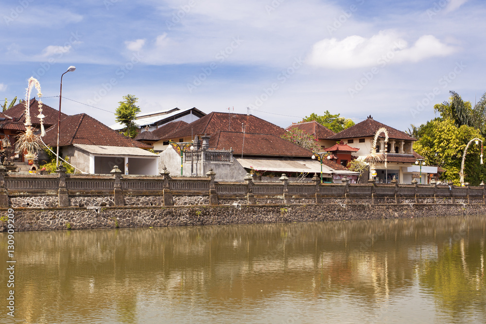 Typical Southasian city in Bali by the river Typical Southasian city in Bali by the river