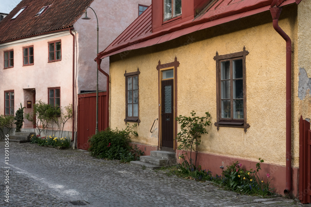 Medieval alley in the historic town Visby on Swedish Baltic sea island Gotland